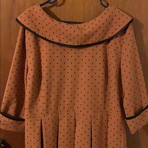 Rust color with black polka dots